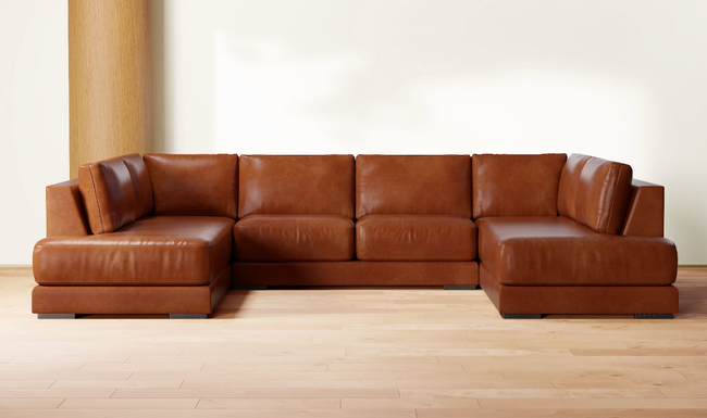 A leather U-shaped sofa