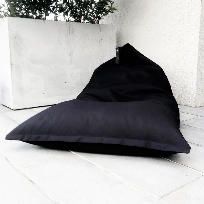 A black beanbag chair.