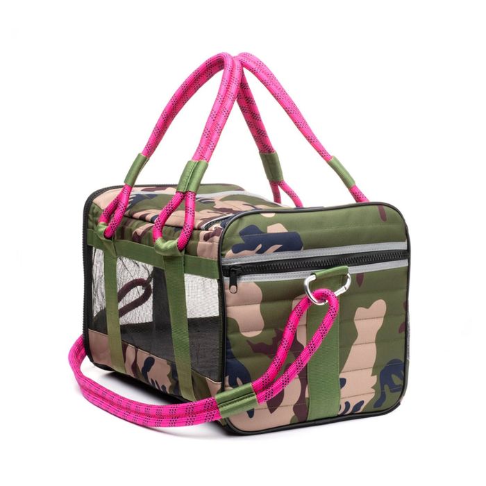 A camouflage and magenta pet carrier, combining style with functionality for your furry friend.