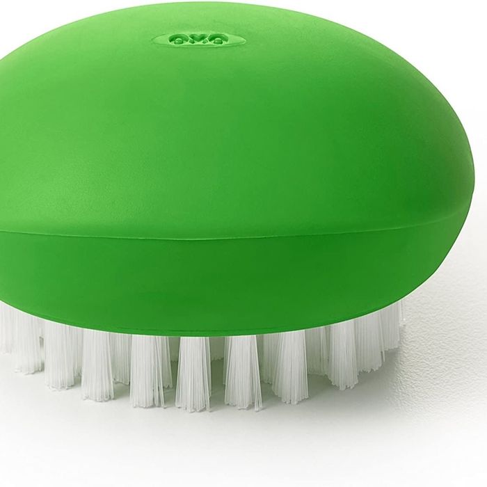 The green veggie brush