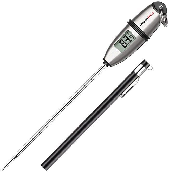 The thermometer and its protective sheath.