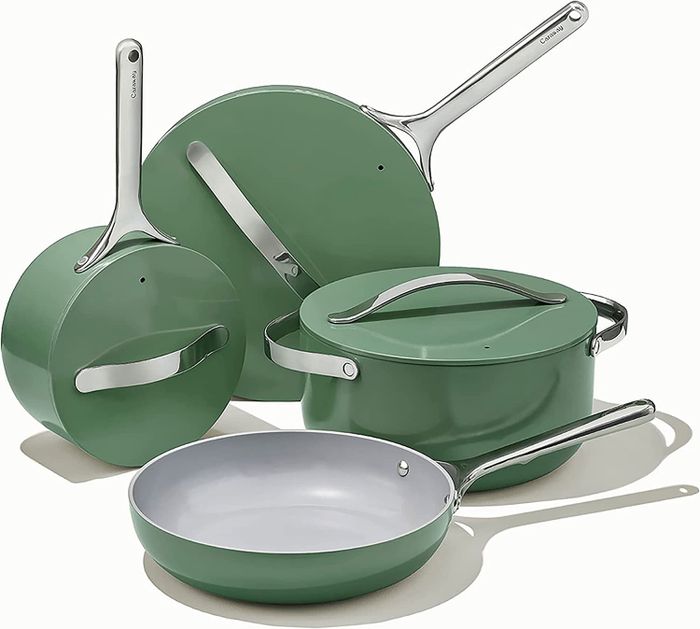 The green set of pans and pots