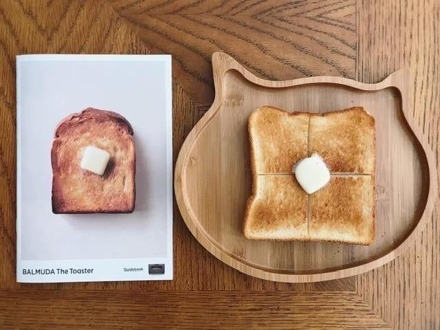 A reviewer's image showing their homemade toast next to the promotional image of toast on the Balmuda box for comparison.