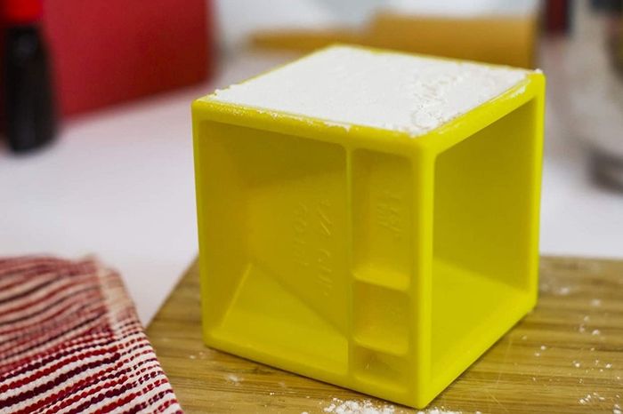 The measuring cube, with different measurements on each face for easy use