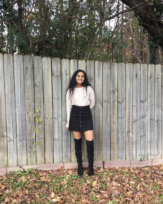 Reviewer wearing black boots