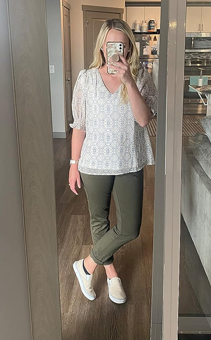 A reviewer rocking the lounge pants in olive green.