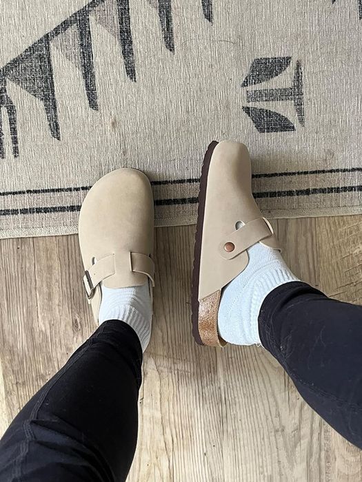Reviewer sporting clogs