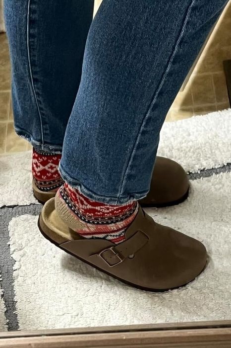 Reviewer wearing footwear