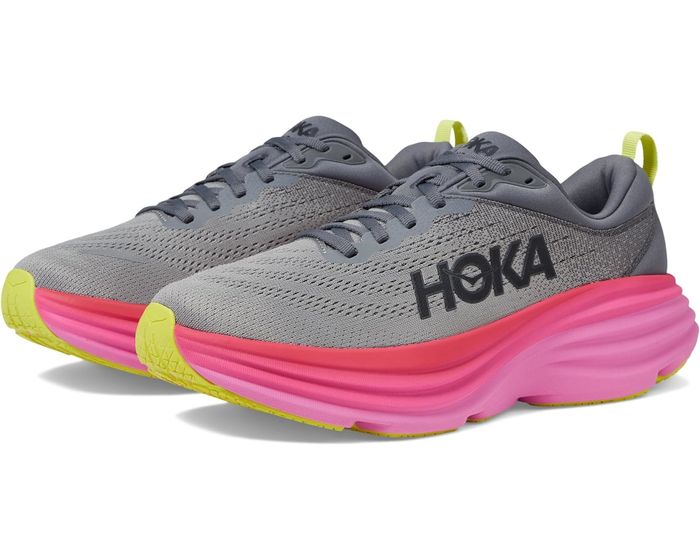 The Hoka shoes in a stylish combination of grey and pink.