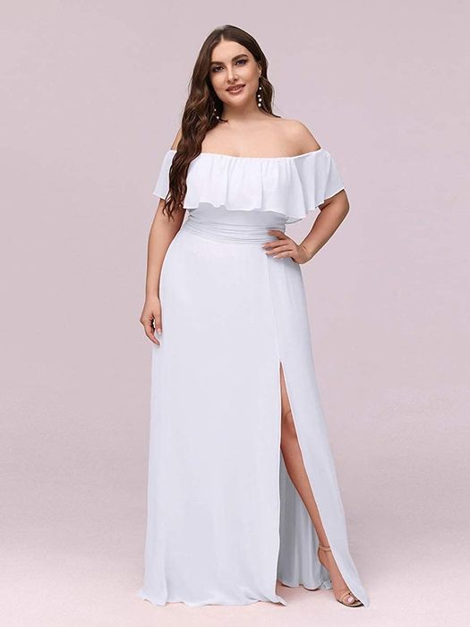 model showcasing the off-shoulder dress with a slit