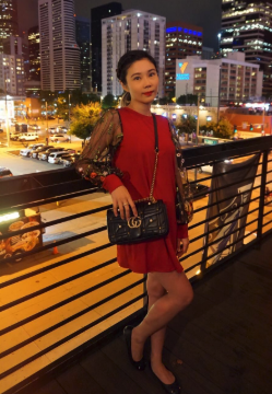 Another reviewer showcasing the same dress in a bold red shade