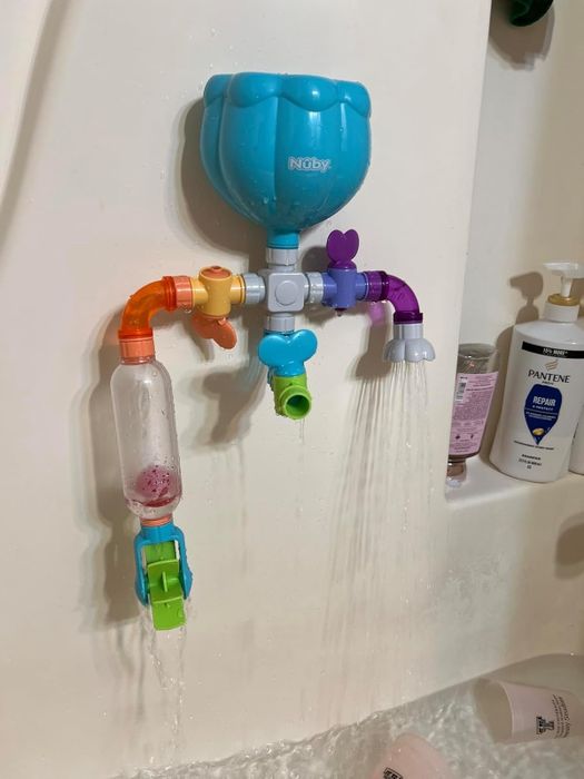 A vibrant children's bath toy with flowing water that turns bath time into a playful experience.