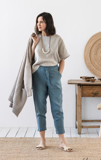 Model wearing blue linen pants
