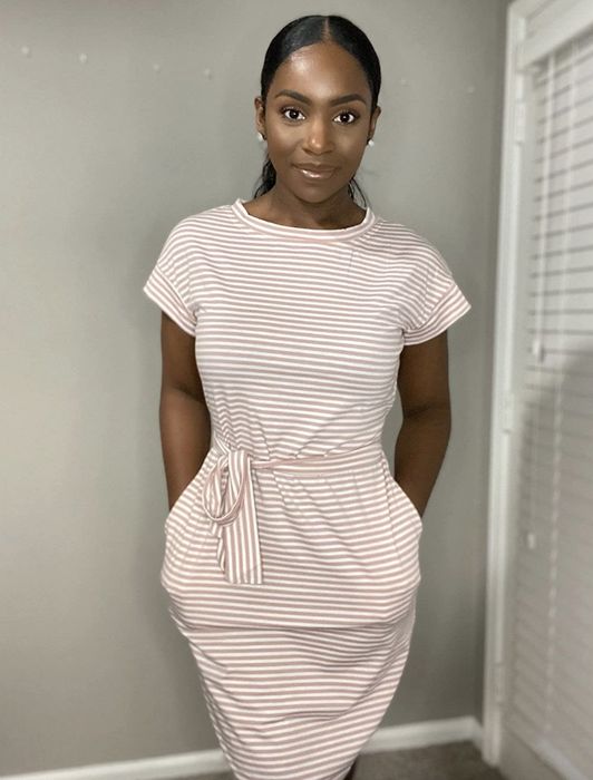 Reviewer styling a striped dress