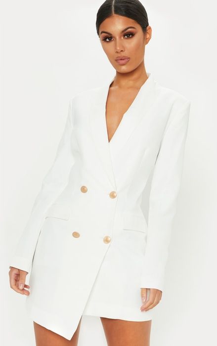 model wearing the white dress