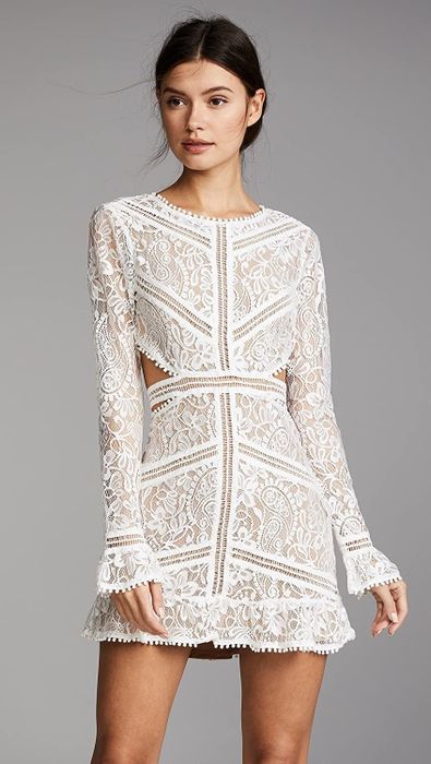 model wearing the high-neck lace dress