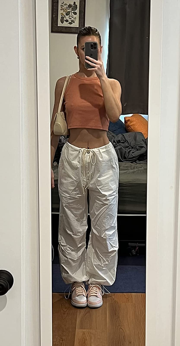 Reviewer mirror selfie in white low-rise cargo pants