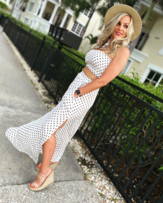reviewer wearing the white version with wedges