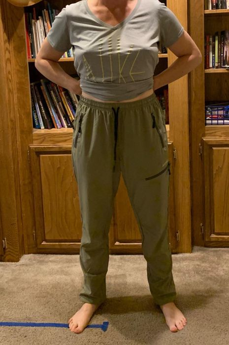 Reviewer photo showcasing the hiking pants in green.