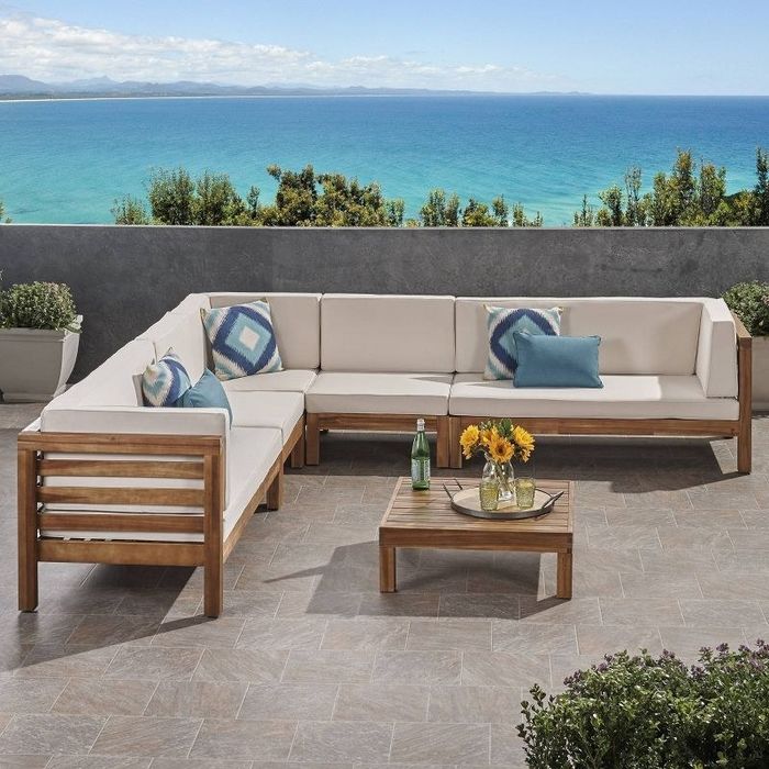 The beige sectional set looks stunning on a terrace, adding both comfort and style to your outdoor area.