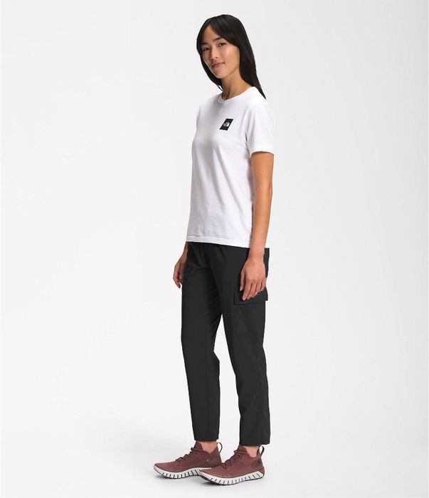 model rocking black cargo pants