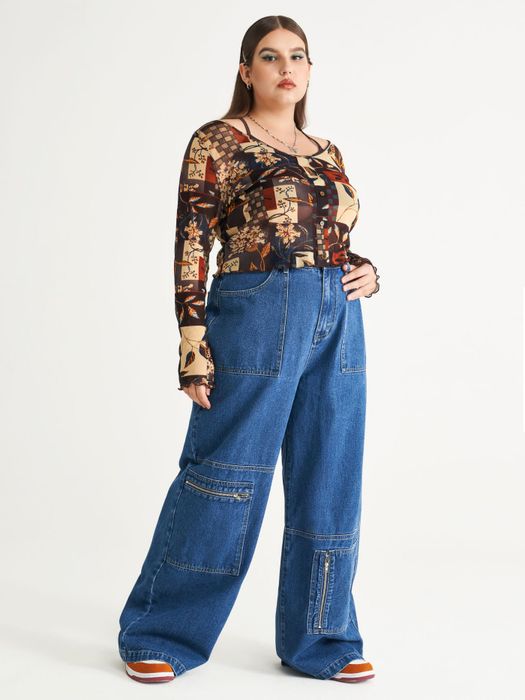 Model wearing a patchwork top paired with wide-leg cargo jeans.