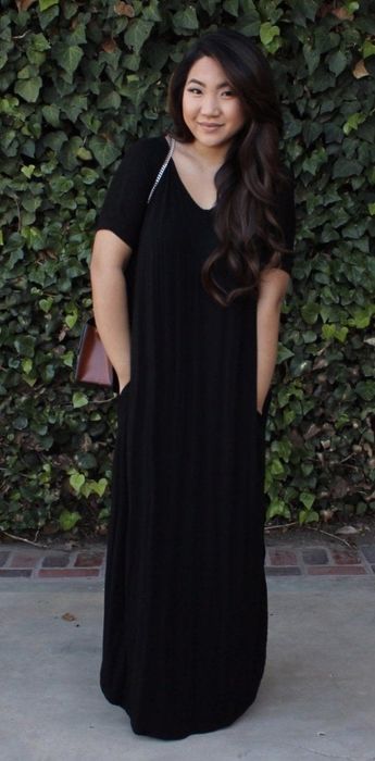 A reviewer is wearing the dress in black.