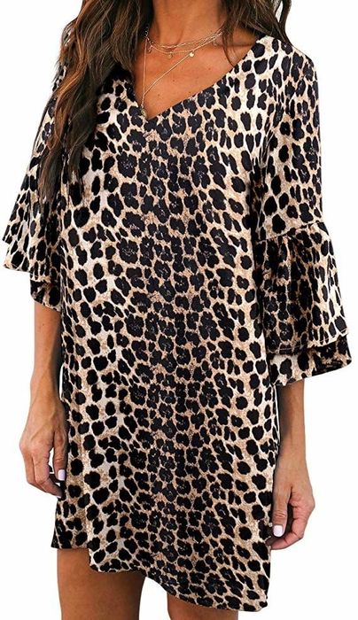 A model showcasing the dress in a chic leopard print