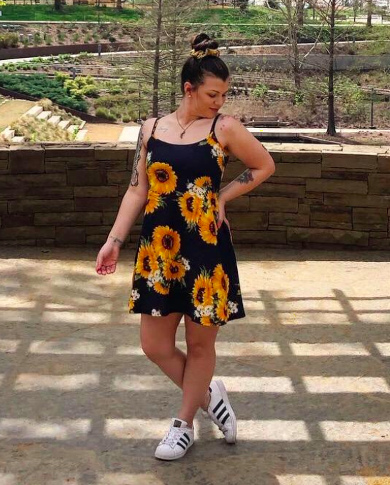 Reviewer wearing the same dress in a size small