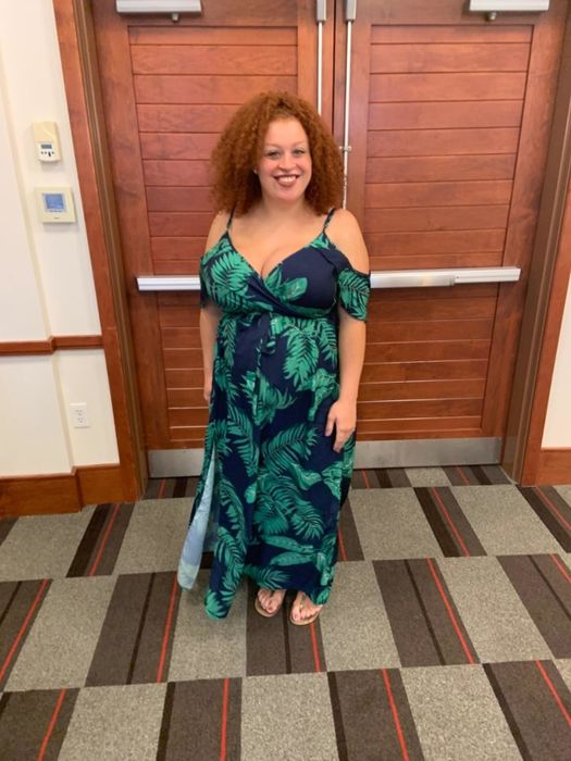 A reviewer wearing the dress.