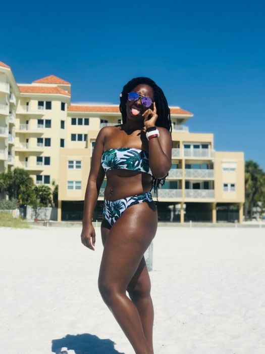 Another reviewer shows off the palm frond–print version of the bikini, perfect for a tropical vibe.