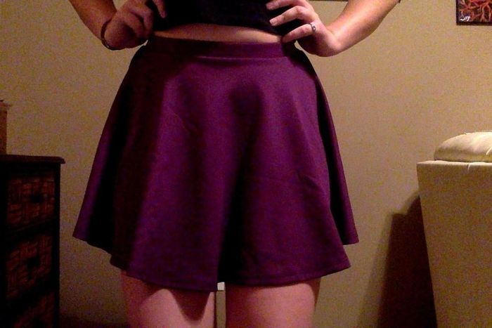 The skirt in a bold and striking purple tone.