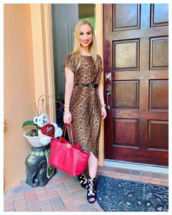 Another reviewer sporting the dress in a bold leopard print design