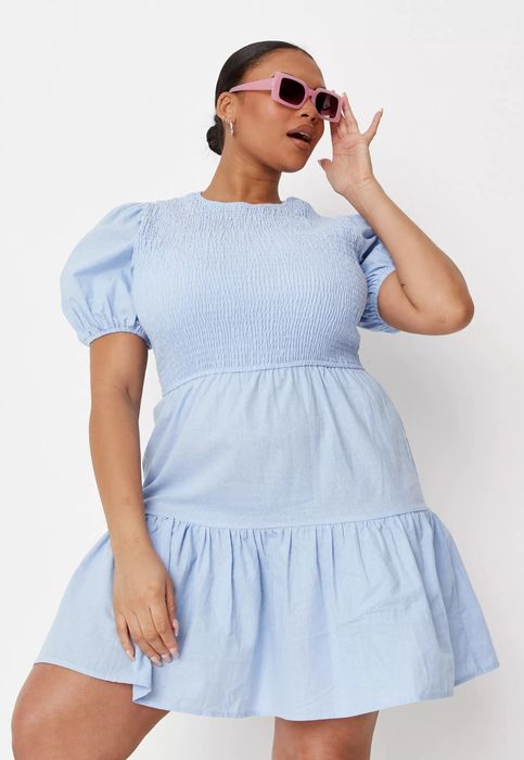 Model wearing the blue dress