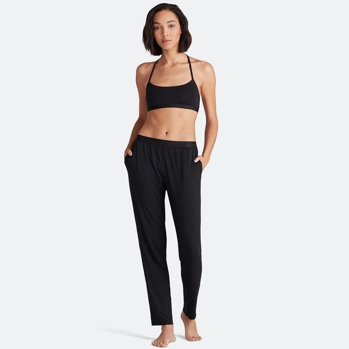 A model showcases the black version of these ultra-comfy pants.