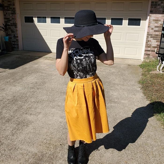 The skirt in a glamorous gold shade.