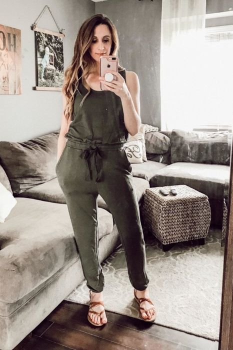 Reviewer rocking the olive-colored jumpsuit with ease.