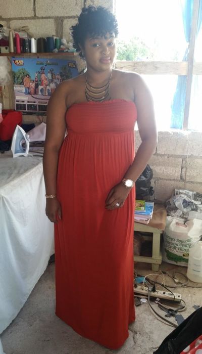 Reviewer in a red dress