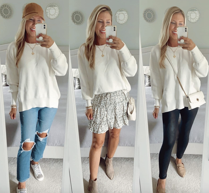 A reviewer is wearing the white sweater styled in three different ways.