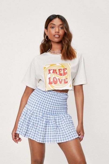 Styled with a crop top.