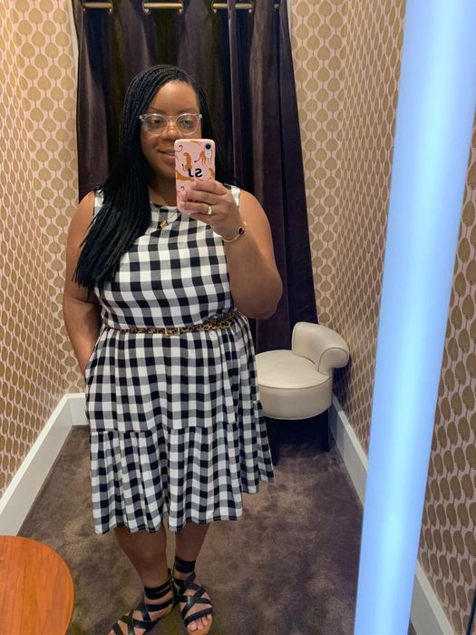 Another reviewer pairs the gingham dress with a belt and strappy sandals for a more styled appearance.