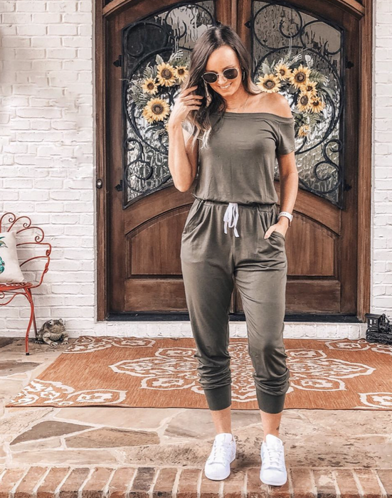 A reviewer is wearing the off-shoulder jumpsuit.