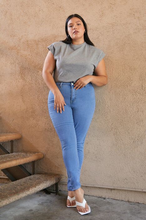 A model wearing blue jeans.