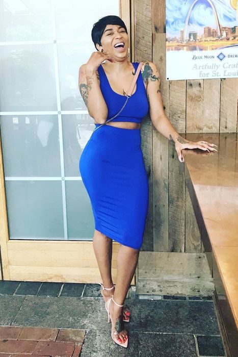 A reviewer rocking the matching set in a bold royal blue