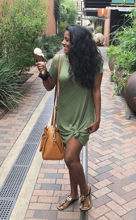 Reviewer rocking a green dress