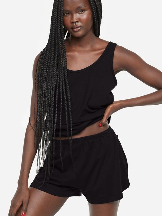 The model is wearing the set.