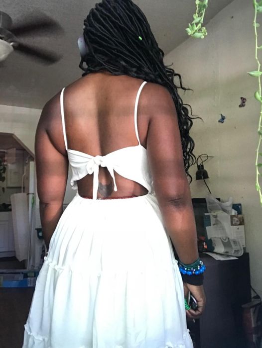 Another reviewer rocking the white version, showing off the bowtie detail in the back.