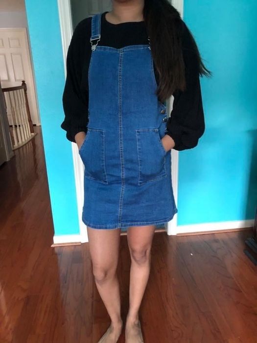 reviewer styling it with a black long-sleeve shirt