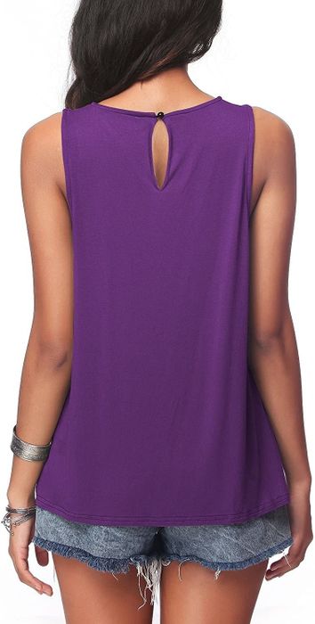 A model showcasing the purple tank, seen from the back, with a delicate keyhole button detail