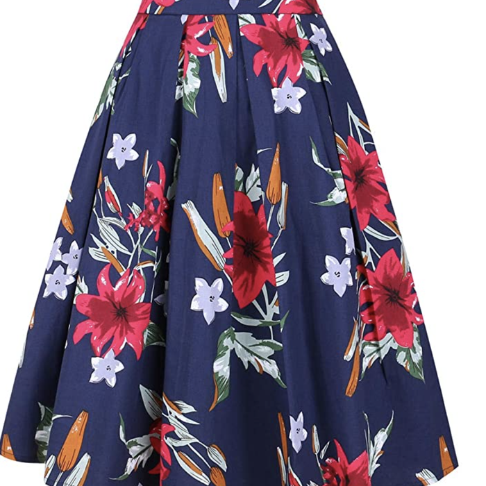 A pleated navy midi skirt adorned with red and pale blue floral prints.